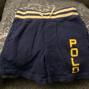 Boys polo shorts size 2t worn navy and yellow